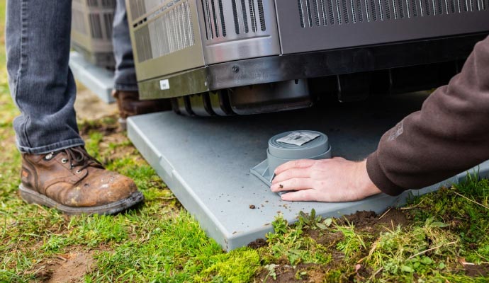 Professional team installing new ac