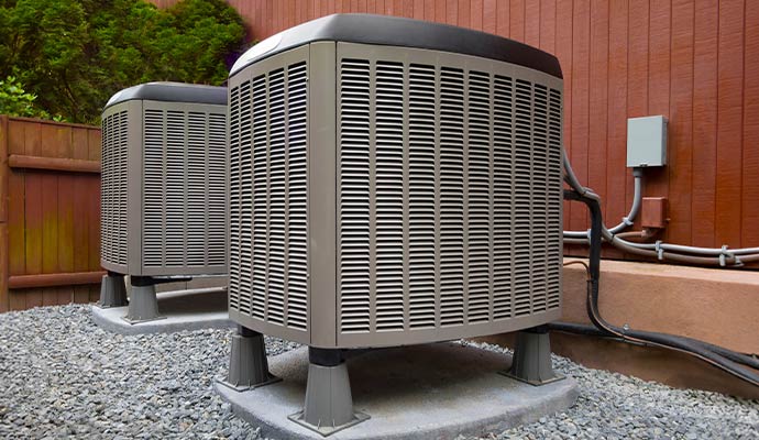 Two newly installed outdoor air conditioning units