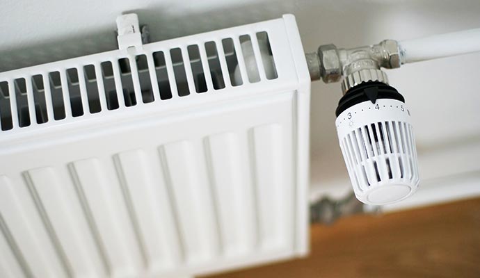 Newly installed radiator Newly installed radiator mounted on the ceiling for heating