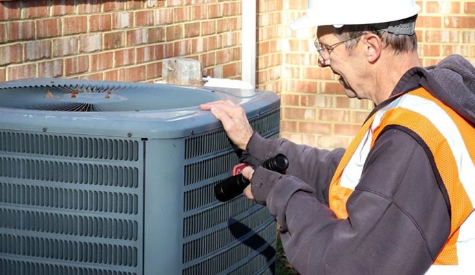 Professional heating system inspection An expert technician inspecting a heating system