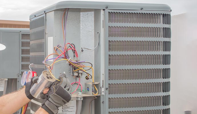 Professional worker maintaining your ac