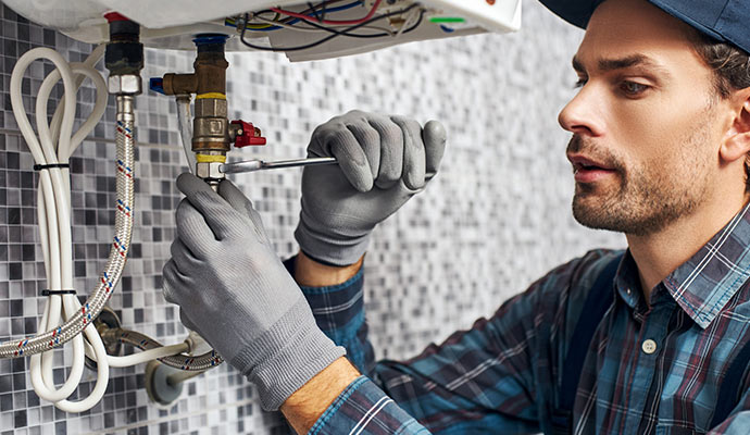 Technician providing heating emergency service.