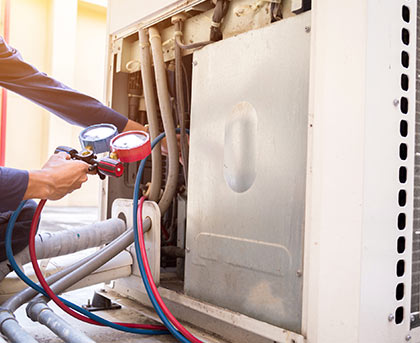 technician tune up air conditioning systems